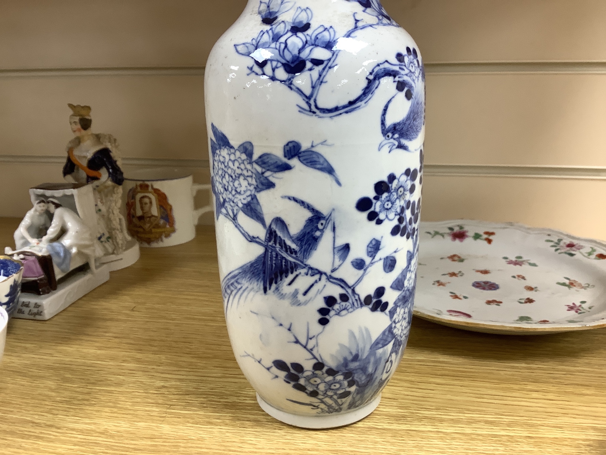 A Chinese late 19th century blue and white vase, height 25.5cm, a pair of 18th century Chinese export famille rose plates and a blue and white tea bowl